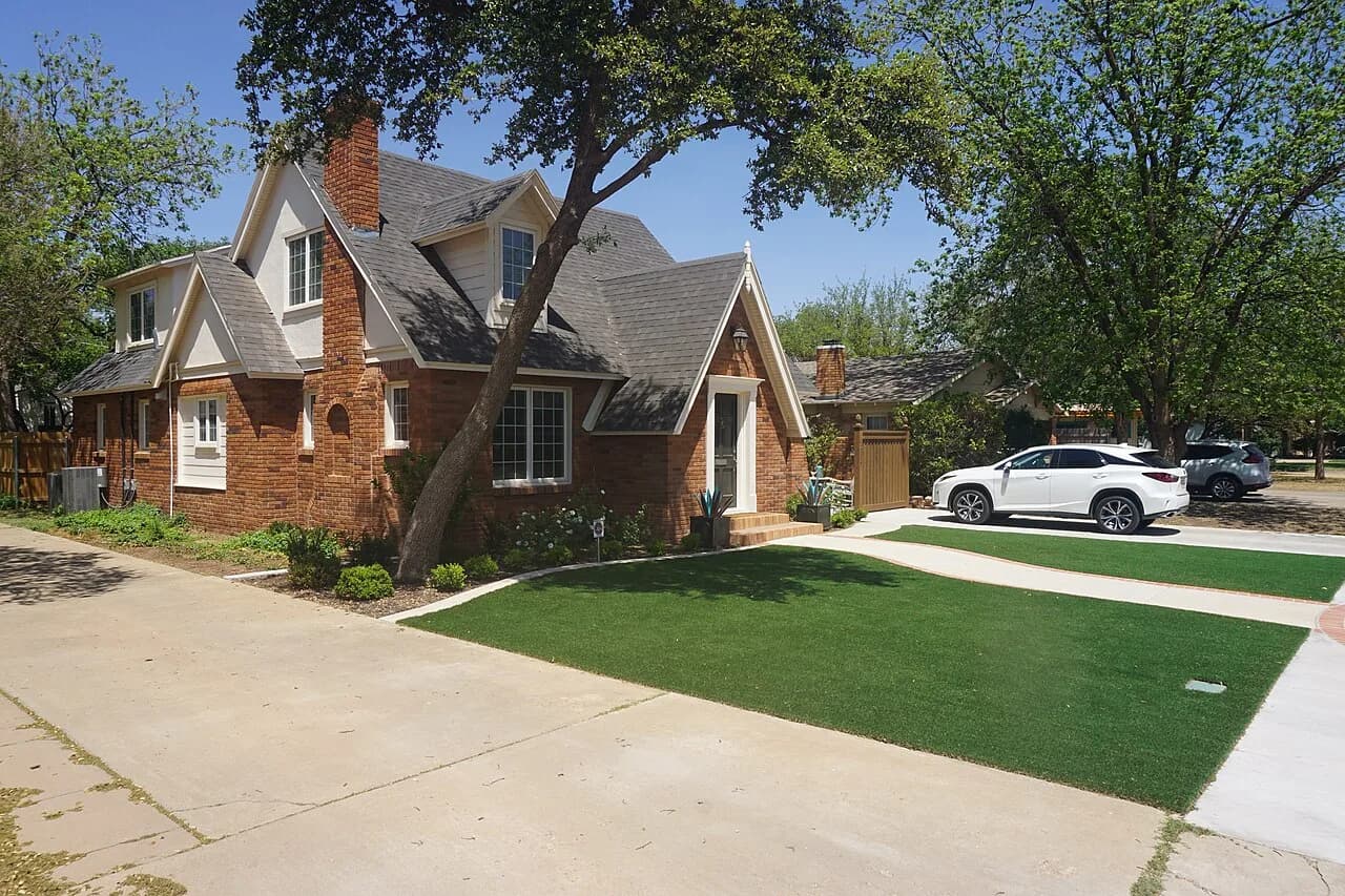 Brick home and mature trees at 2806 20th Street in Tech Terrace, Lubbock